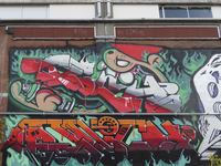 902764 Afbeelding van een graffitikunstwerk met een Utrechtse kabouter (KBTR), op het terrein tussen het gebouw van de ...